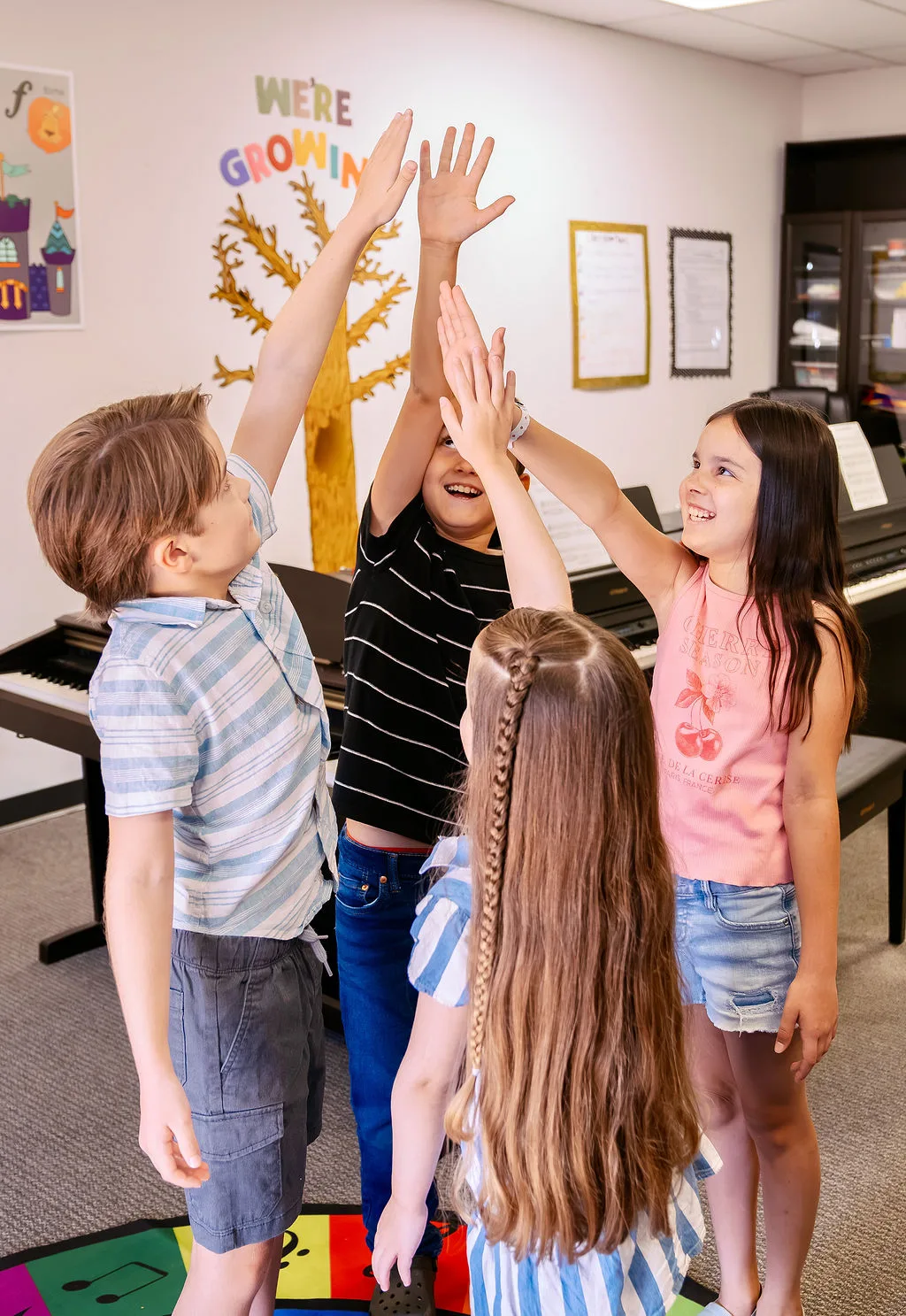 Students celebrating together after playing as a group.