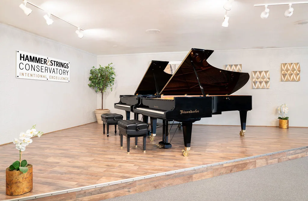 Two grand pianos on the Conservatory stage.